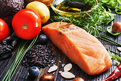 Display of Salmon, Olive Oil, and healthy food ingredients