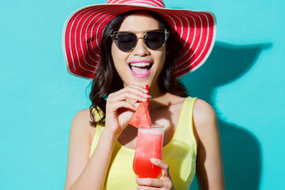 woman drinking watermelon drink