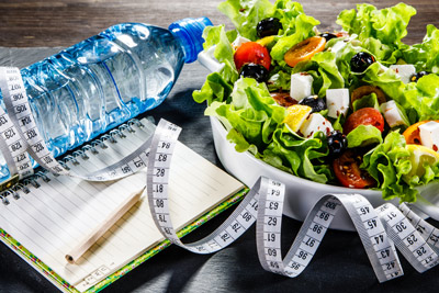 salad, water bottle, food journal