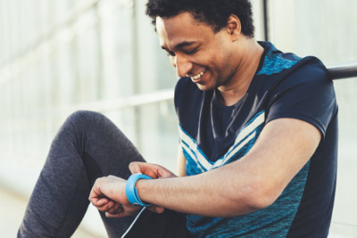 man checking his fitness watch